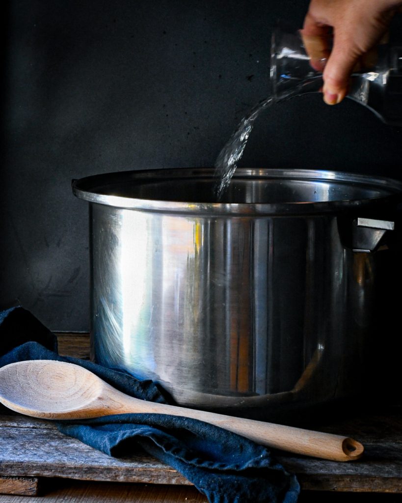 Pouring water into pot